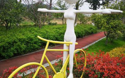 景區(qū)公園玻璃鋼抽象景觀騎自行車的人物雕塑